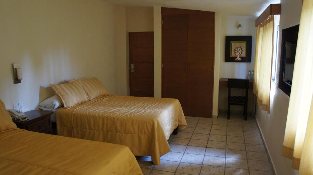 Coral Pacifico Hotel Y Villas Manzanillo Rum bild